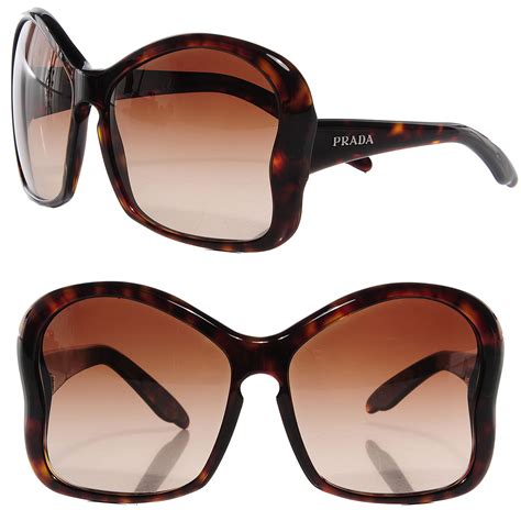 butterfly frame sunglasses.